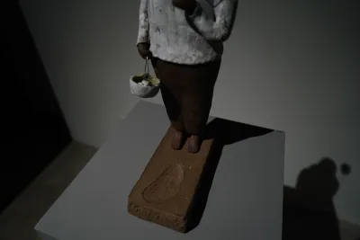 Figure Sculpture with Balloon