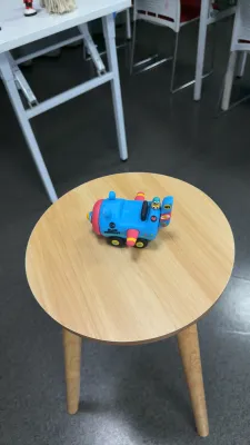 Blue Toy Plane on Round Table